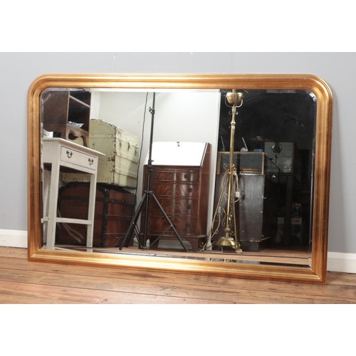 306 - A very large gilt frame mirror. 97cm x 152cm.