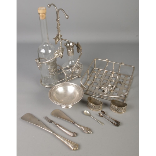 71 - A quantity of mostly silver plate. Includes silver handled shoe horns, James Dixon silver plated bon... 