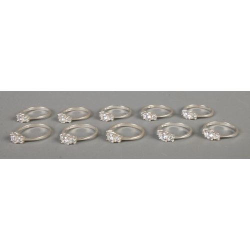 344 - Ten silver and three stone Cubic Zirconia rings, of various  sizes. Total weight: 20.4g