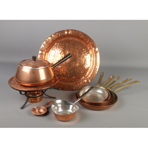 74 - A quantity of copper items. Includes Spring Culinox fondue set, Lombard dish etc.