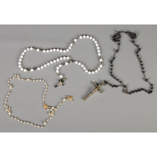 358 - Three rosary bead necklaces.