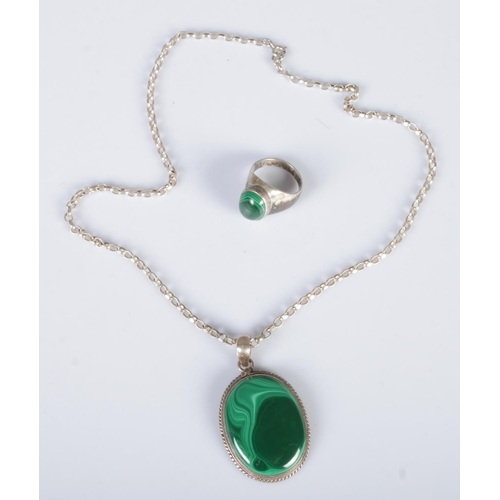 359 - A silver and malachite pendant on chain along with a matching ring.