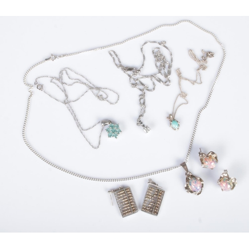 367 - A quantity of silver and white metal jewellery. Includes opal pendant and earrings, abacus earrings,... 