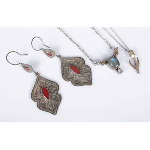 368 - Two silver pendants on silver chain along with a pair of white metal droplet earrings.