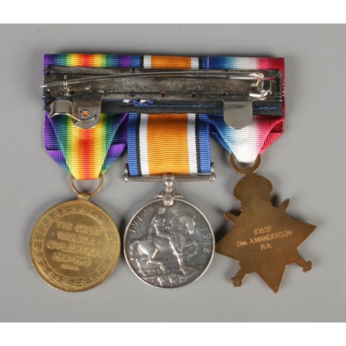 380 - A trio of World War I medals to include 1914-15 Star, British war medal and victory medal. Awarded t... 