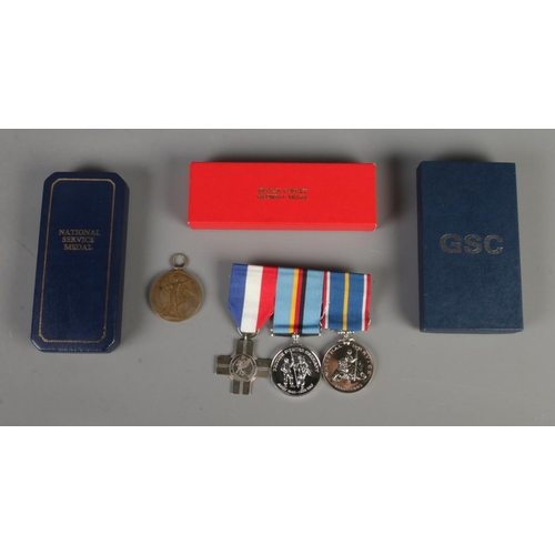 383 - A collection of medals to include Great War Medal (Awarded to 706074 CPL. W.Rogerson R.A), silver Fo... 