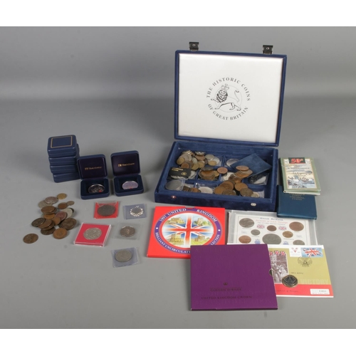 411 - A collection of assorted British coins, mainly commemorative examples. To include 1997 Brilliant Unc... 