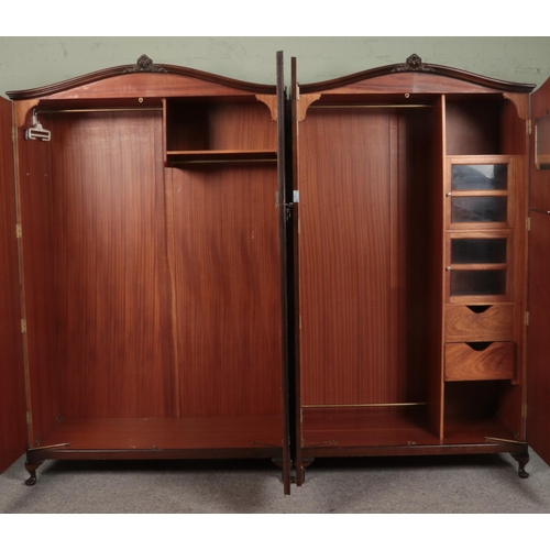 416 - A walnut bedroom suite, Butilux by Marcus Ltd. Includes two wardrobes, one with fitted interior and ... 