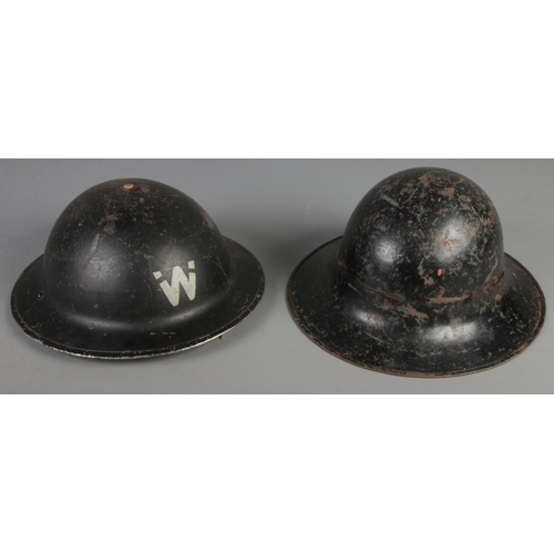 138 - Two painted WWII Tommy/Brodie helmets.