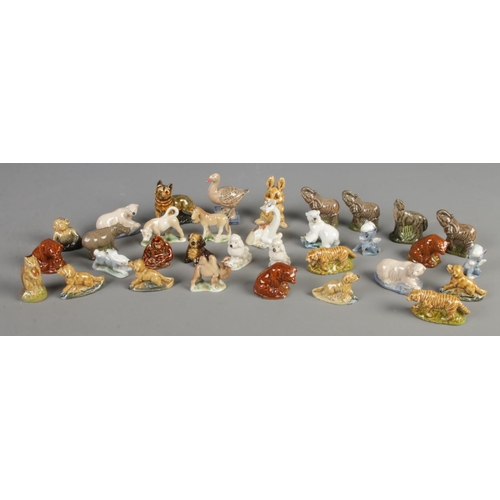 144 - A quantity of large Wade whimsies. Includes goose, elephants, rabbit, camel, polar bears, etc. Large... 