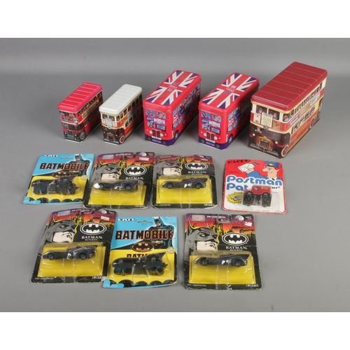 203 - A collection of unopened ERTL diecast vehicles mostly Batmobile models and one Postman Pat Mail Van ... 