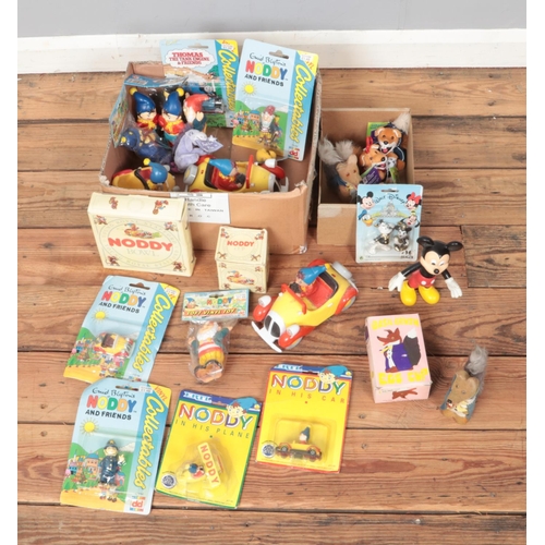 217 - Two boxes of children's toys and collectables to include Mickey Mouse figures, Basil Brush egg cup, ... 