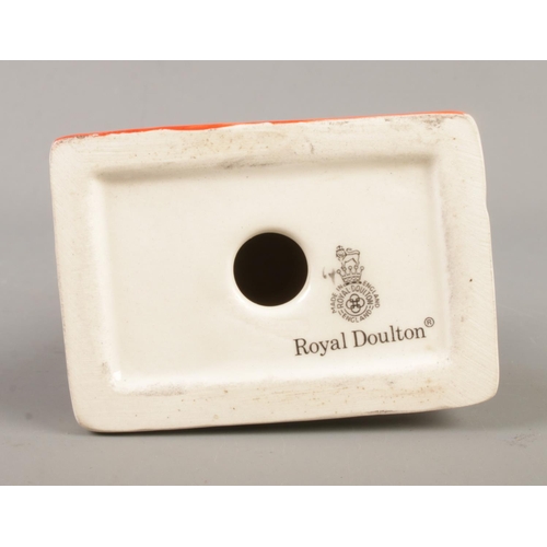 381 - A Royal Doulton for Penguin books figure modelled as penguin standing upon a book titled 'Best Wishe... 