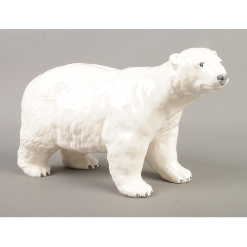 382 - A Beswick figure modelled as a polar bear. Approx. height 12cm.