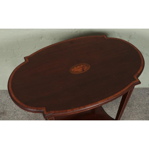 413 - A mahogany two tier window table with shell patera inlay.