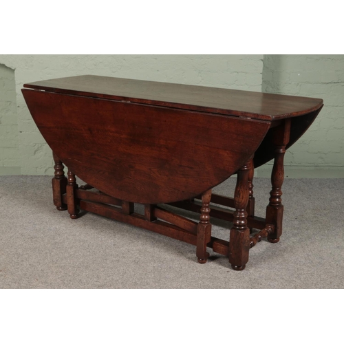 430 - An oak wake table in the manner of Titchmarsh & Goodwin.

Hx74cm
Wx167cm
Dx154cm