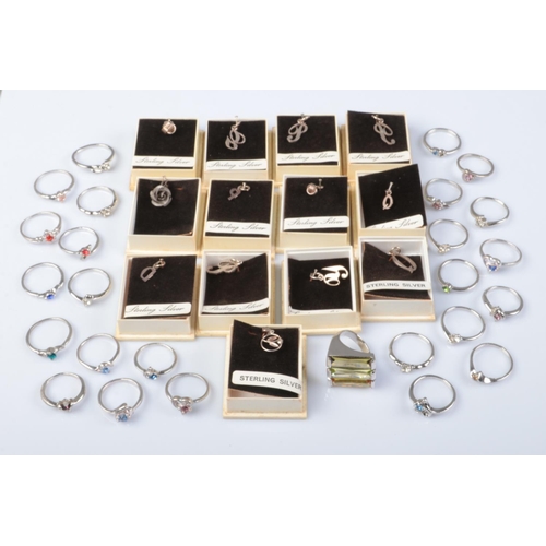 354 - A collection of sterling silver charms of mostly alphabet examples (6.83g) along with 26 white metal... 