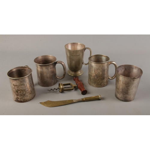 8 - A selection of pub measuring tankards together with a trench art souvenir letter opener and corkscre... 