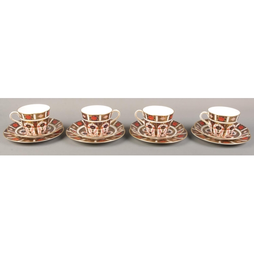 360 - Four Royal Crown Derby Imari trios. 1128 pattern.