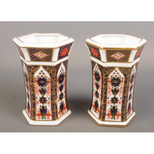 361 - A pair of Royal Crown Derby Imari vases. 1128 pattern, 11cm. First quality.