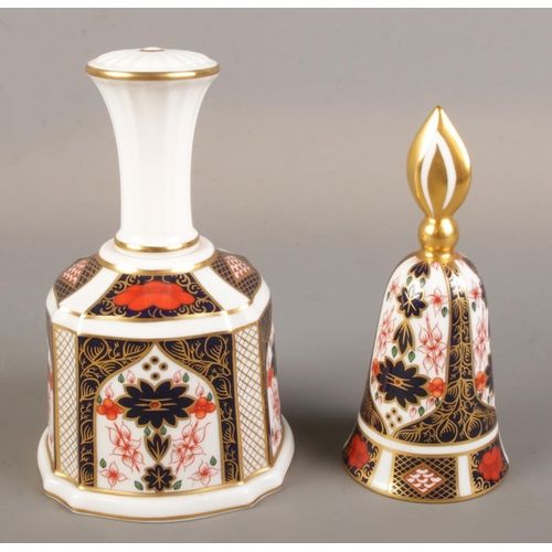 369 - A Royal Crown Derby Imari bell along with a matching candle snuffer. 1128 pattern. First quality.