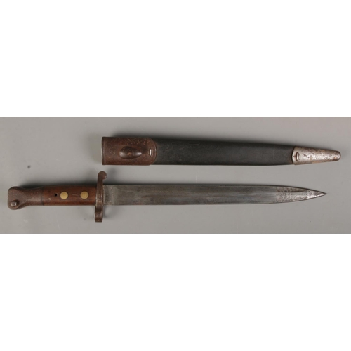 371 - A British 1888 pattern Lee Metford bayonet by Mole, with scabbard. Blade length 30cm. CANNOT POST OV... 