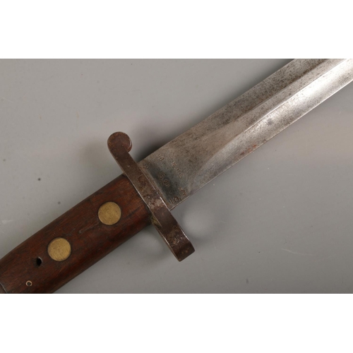 371 - A British 1888 pattern Lee Metford bayonet by Mole, with scabbard. Blade length 30cm. CANNOT POST OV... 