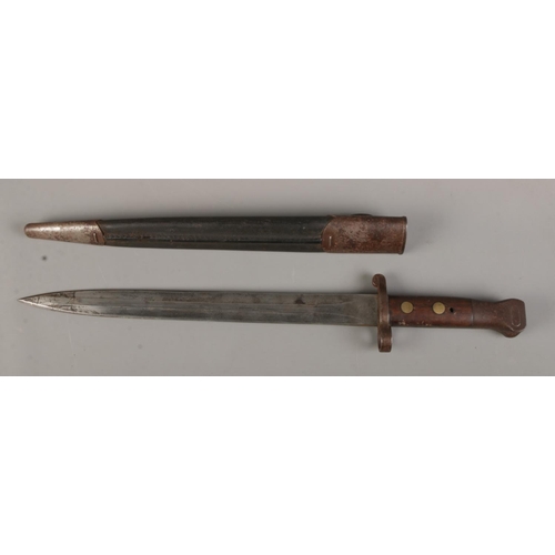 371 - A British 1888 pattern Lee Metford bayonet by Mole, with scabbard. Blade length 30cm. CANNOT POST OV... 