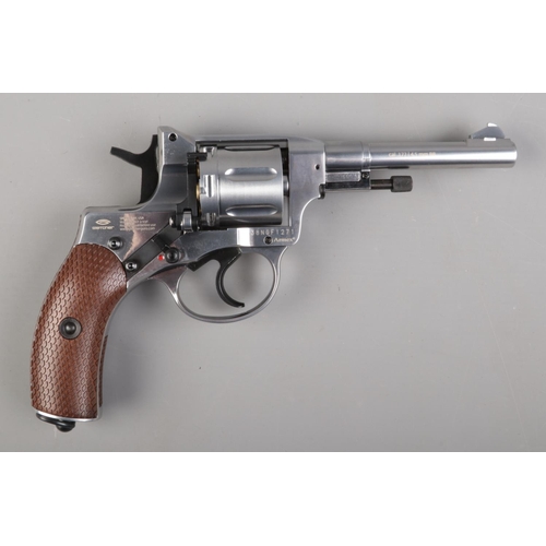 380 - A boxed Gletcher NGT F silver .177cal air gun along with bottle of pellets and The Last Fighter spor... 