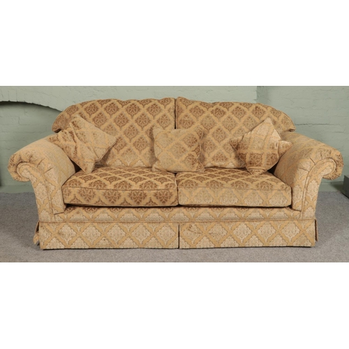 384 - A three piece sofa suite with beige floral upholstery. Comprising of three seat sofa, two seat sofa ... 