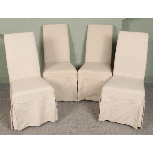 389 - A set of four modern dining chairs.