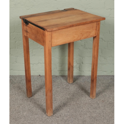 403 - A vintage wooden school desk. (79cm x 56cm x 46cm)