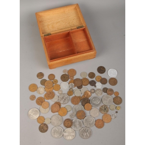 19 - A quantity of coins. Includes commemorative crowns, Victorian Model 10th farthing is case, early 20t... 