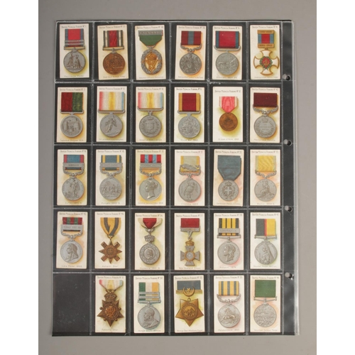 138 - Taddy cigarette cards, Medals & Ribbons, Part set/odds, 29 cards.