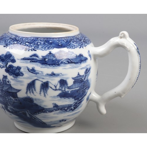 359 - A 19th century bullet shape teapot with blue and white transfer print and lotus flower bud finial. H... 