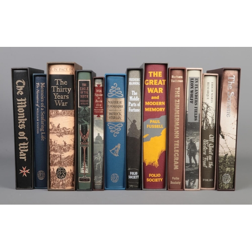 392 - The Folio Society; eleven books, some surrounding WWI topics including 'The Somme', 'The Great War a... 