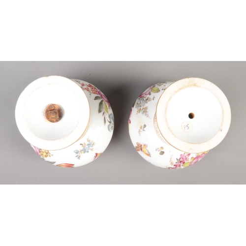 2 - A pair of hand painted continental Meissen style pot pourri jar and cover. Decorated with flowers (1... 