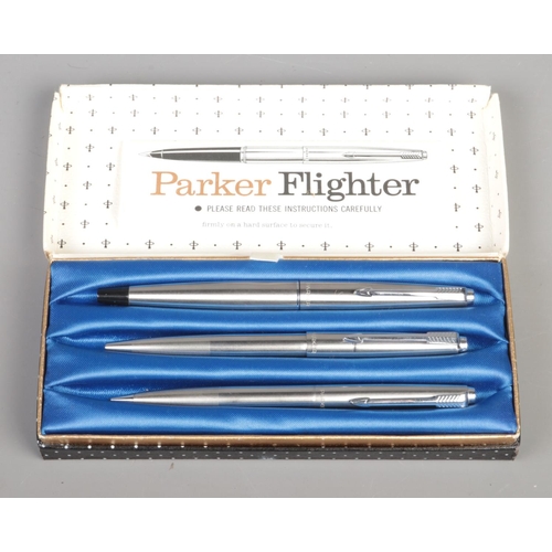 60 - A boxed Parker 'Flighter' pen set, to include fountain pen, ball point pen and propelling pencil, in... 