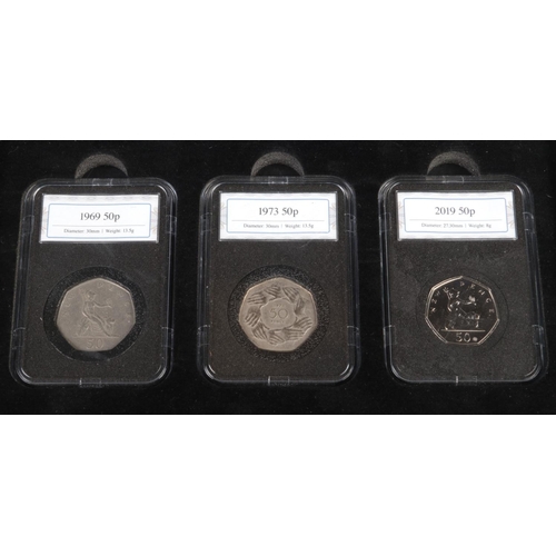 70 - A partly filled coin folder containing mainly 1947-49 two shillings pieces, together with a presenta... 