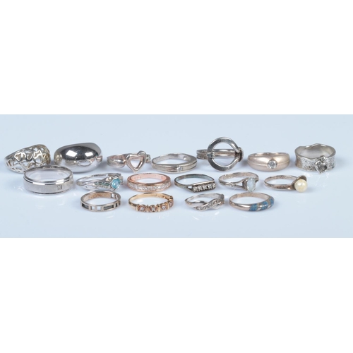 316 - Seventeen silver rings, of varying sizes and designs. To include diamond set and pierced heart examp... 