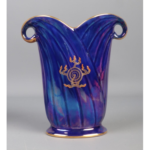 81 - A Crown Devon blue lustre vase depicting an oriental style dragon, together with a quartz Comitti ma... 