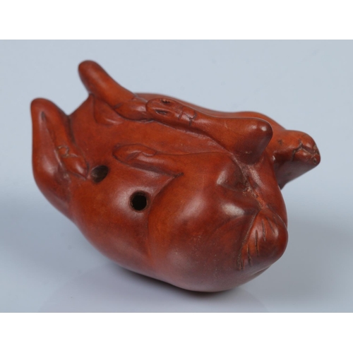 336 - A Japanese carved Netsuke in the form of a resting deer