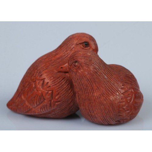 338 - A Japanese carved Netsuke in the form of two sweet birds