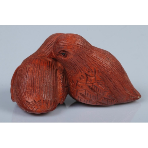 338 - A Japanese carved Netsuke in the form of two sweet birds