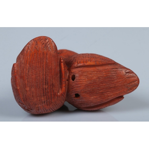 338 - A Japanese carved Netsuke in the form of two sweet birds