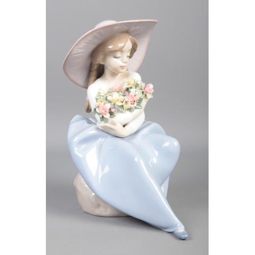 346 - A Lladro figure, titled: 'Fragrant Bouquet Girl', No. 5862.