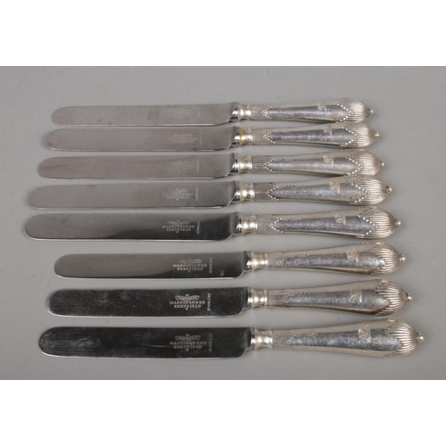 360 - Eight silver handled and stainless steel bladed knives. In two sizes, assayed for Sheffield, 1927. W... 