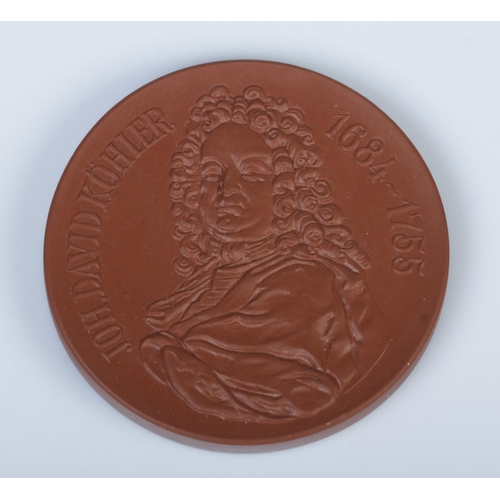 361 - A Meissen commemorative porcelain medal celebrating Johann David Köhler (1684-1755).