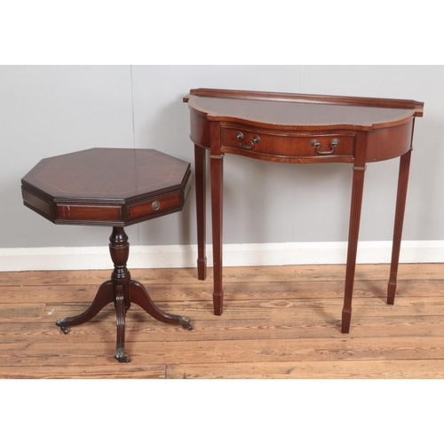 369 - A serpentine mahogany console table with singular draw and square tapered legs together with a octag... 