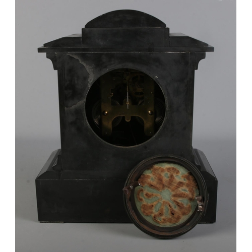 38 - A slate and marble presentation mantle clock presented to Mr. & Mrs. Richardson by the W.C.C.